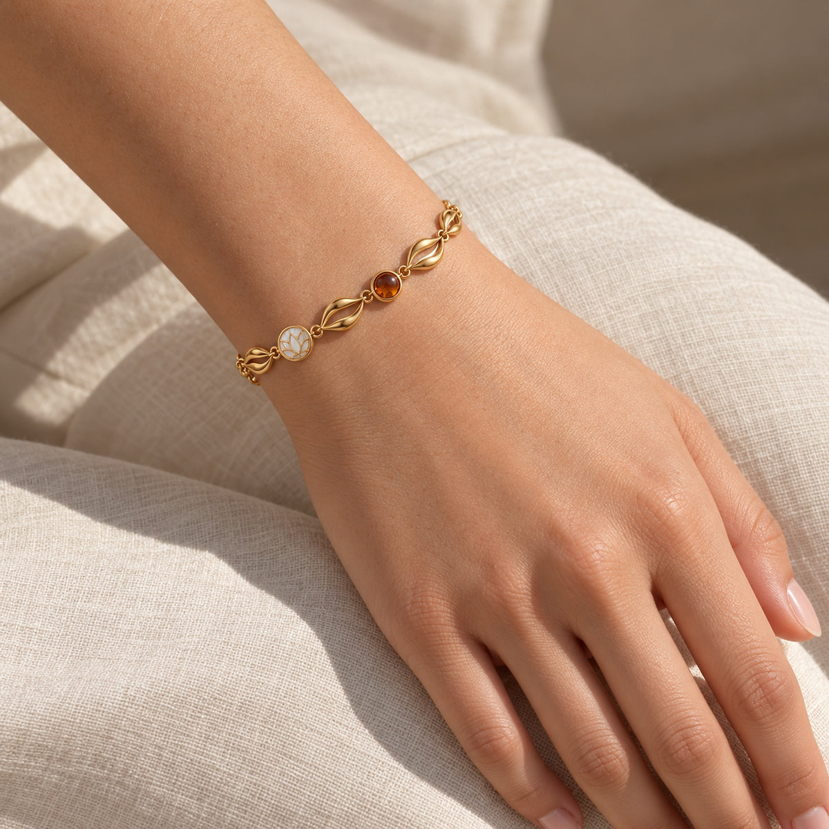 Lotus Tea Amber Bracelet in gold, worn