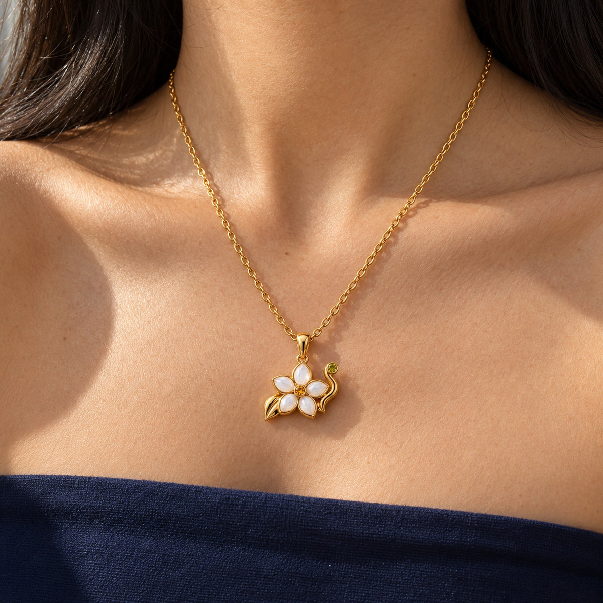 Lotus Tea Jasmine Necklace in gold, worn