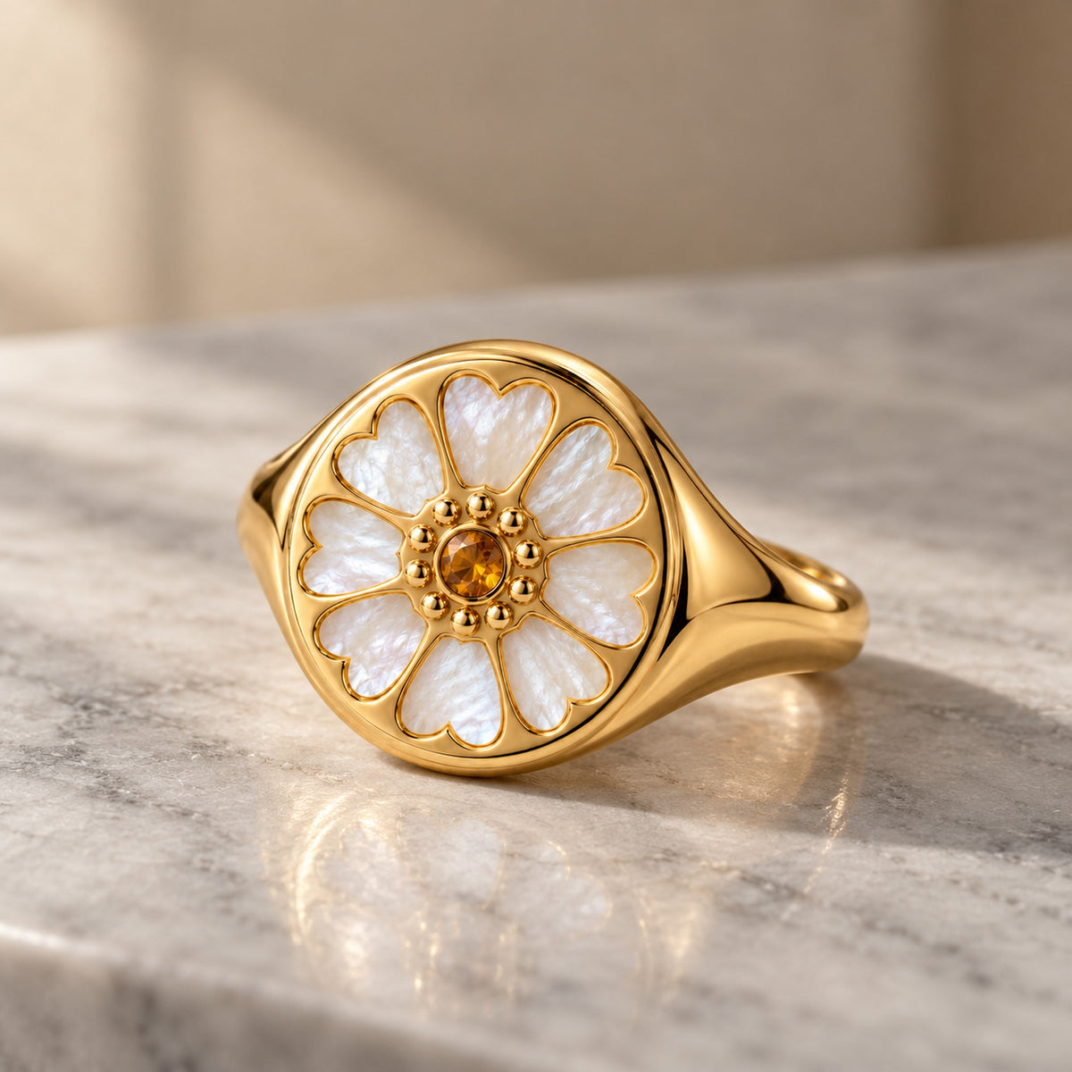 Lotus Tea Signet Ring in gold, styled
