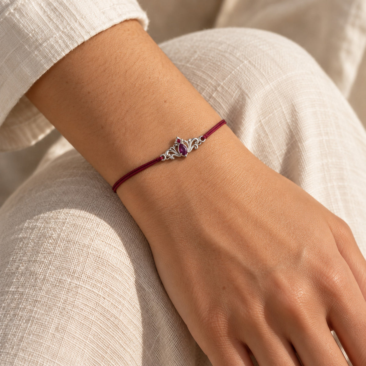 Loulan Cord Bracelet in silver, worn on the wrist