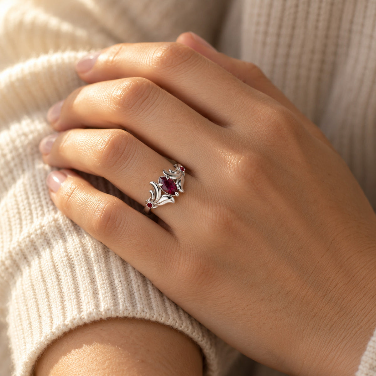 Loulan Crest Ring in silver, worn on the hand