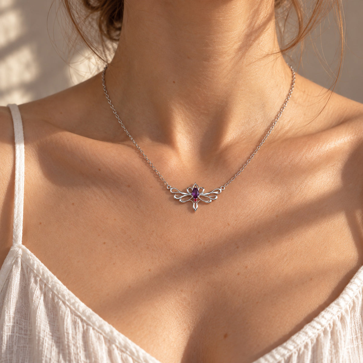Loulan Yoke Necklace in silver, worn