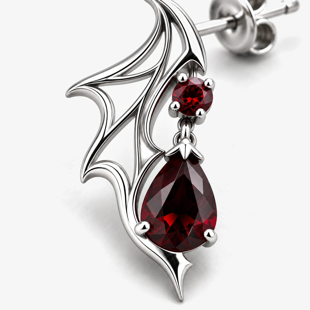 Crimson Wing Drop Earrings in Silver, close-up of the stone setting