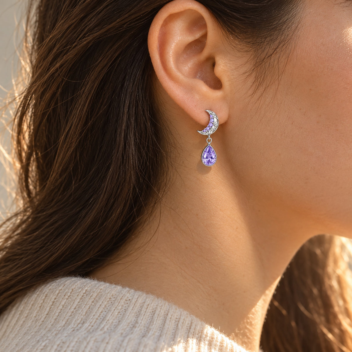 Moon Fairy Full Collection in silver, the earrings worn