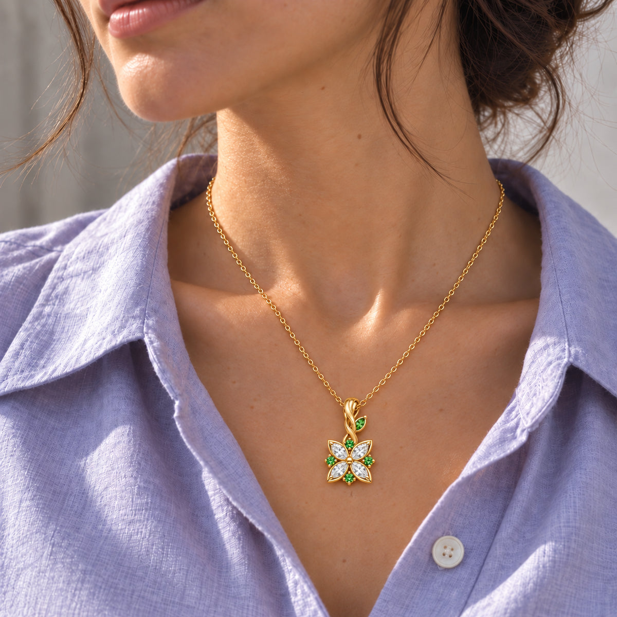 Nahida Necklace in gold worn at the collarbone