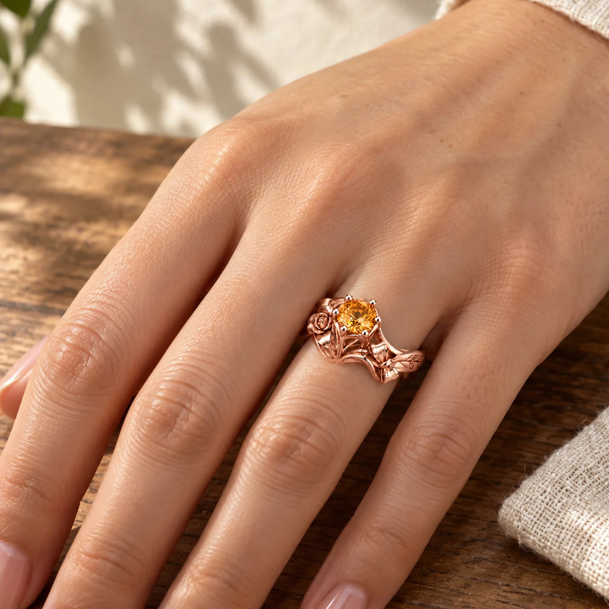 Navia Ring in rose gold worn on the hand