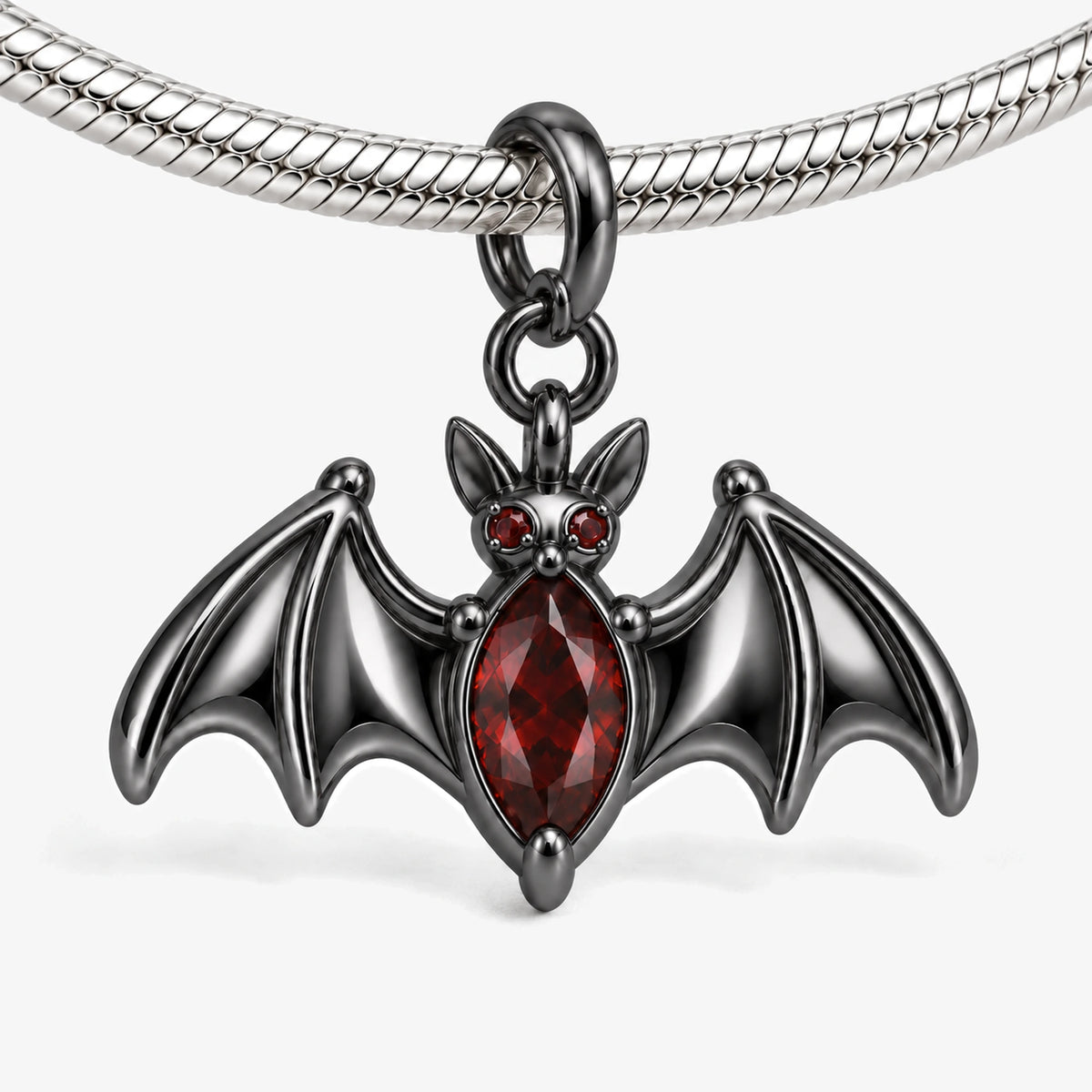 Crimson Wing Bat Charm in Royal Black, on our silver snake-chain charm bracelet