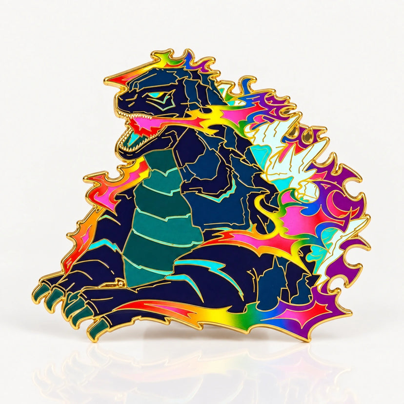 Pridezilla Glow-in-Dark Enamel Pin by Kraymer Art, front view on white