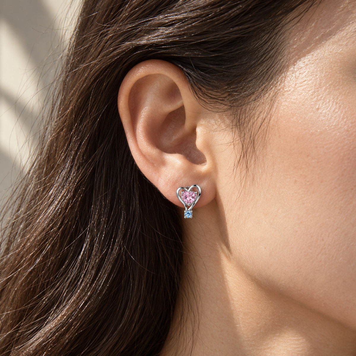 Ribbon Path Studs in silver, worn