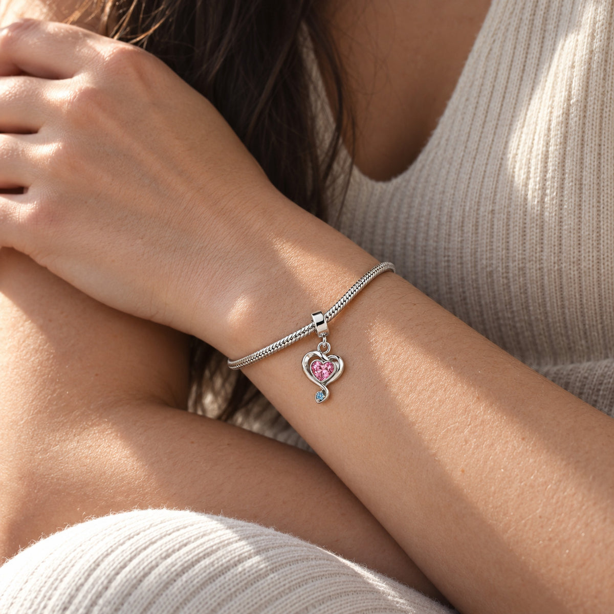 Ribbon Path Charm in silver, worn