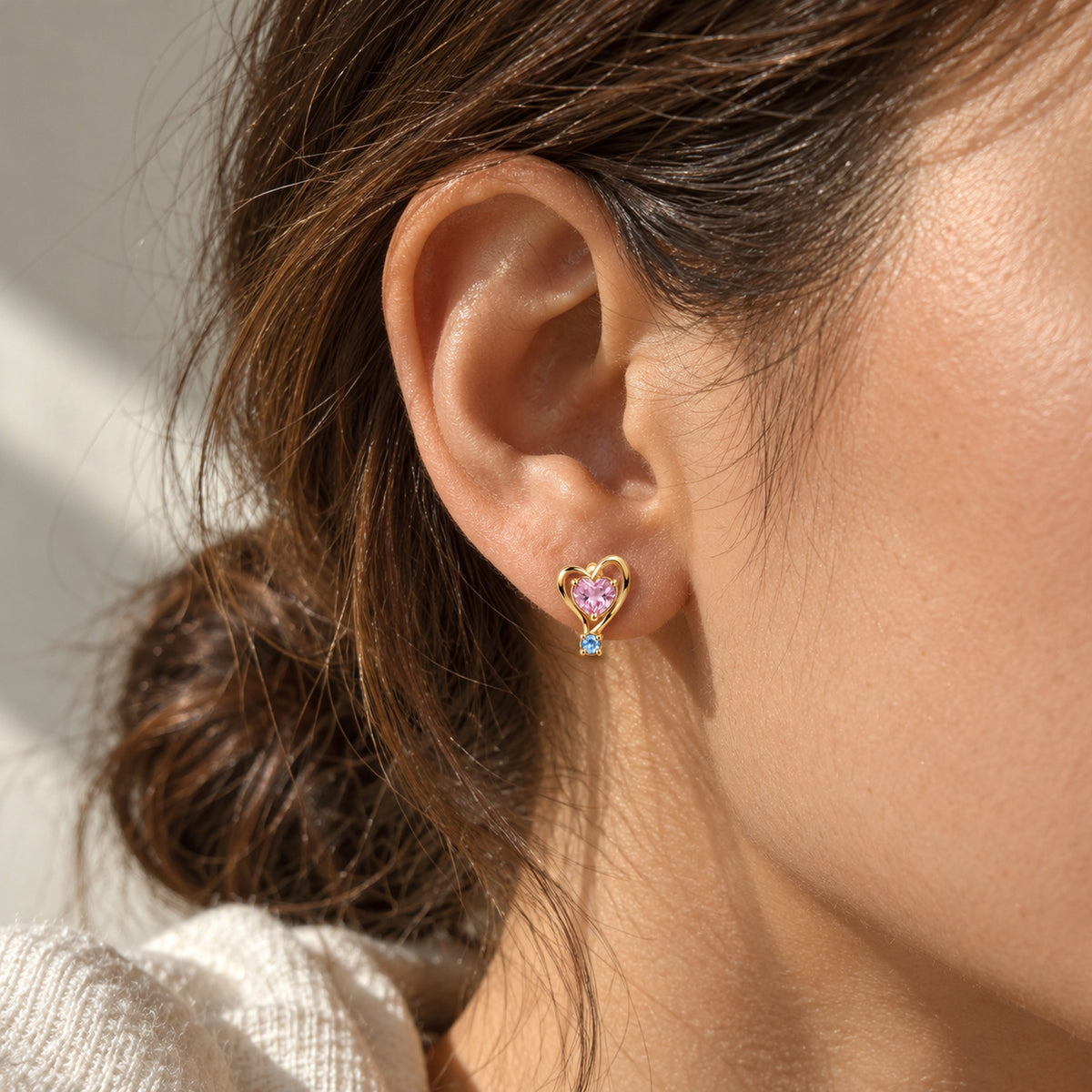 Ribbon Path Studs in gold, worn