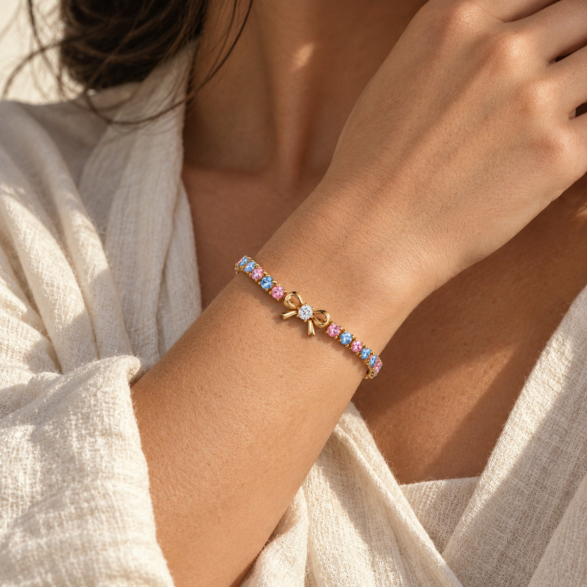 Ribbon Path Bracelet in gold, worn
