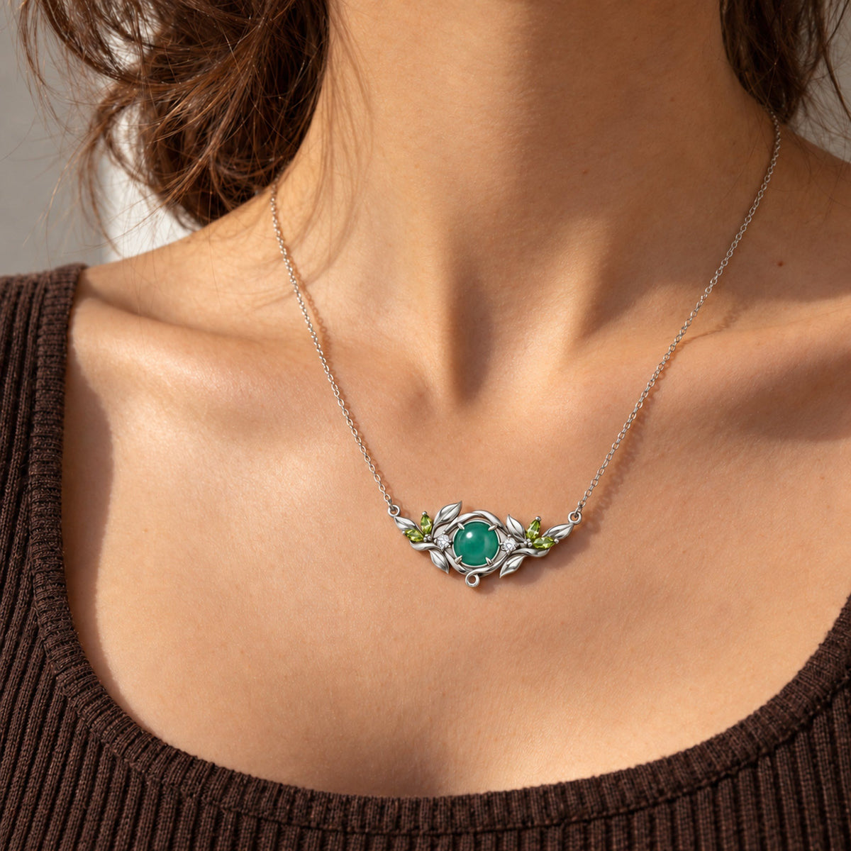 Seed Bloom Necklace in silver, worn