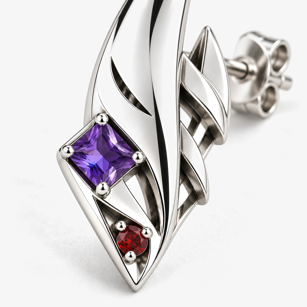 Grin Shade Studs in silver, close-up