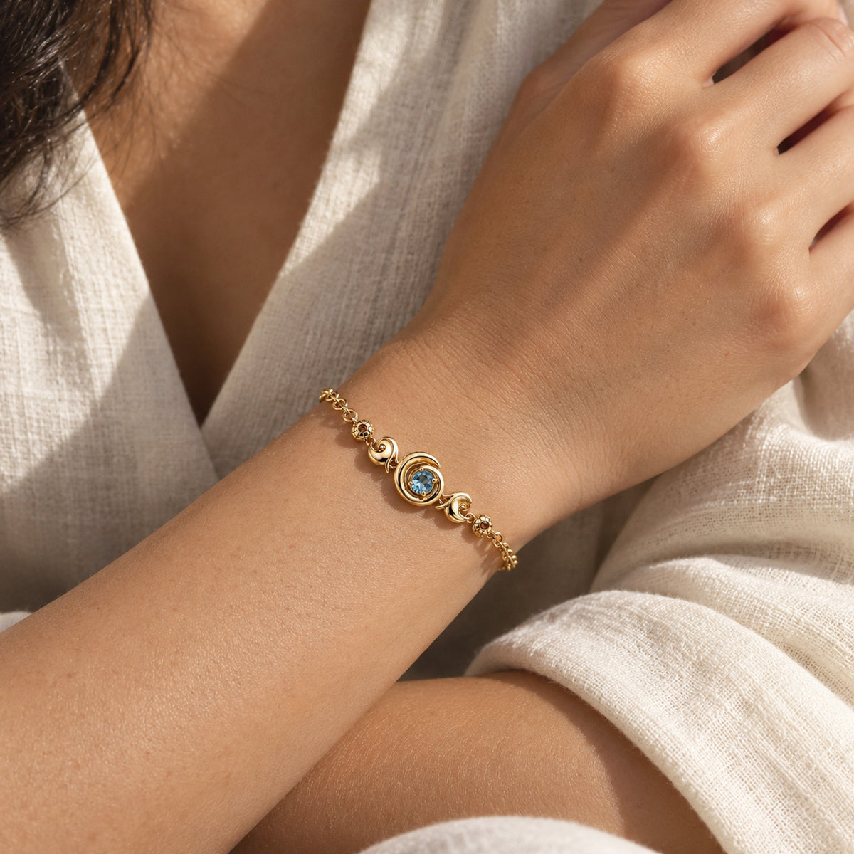 Bubble Shell Bracelet in gold, worn