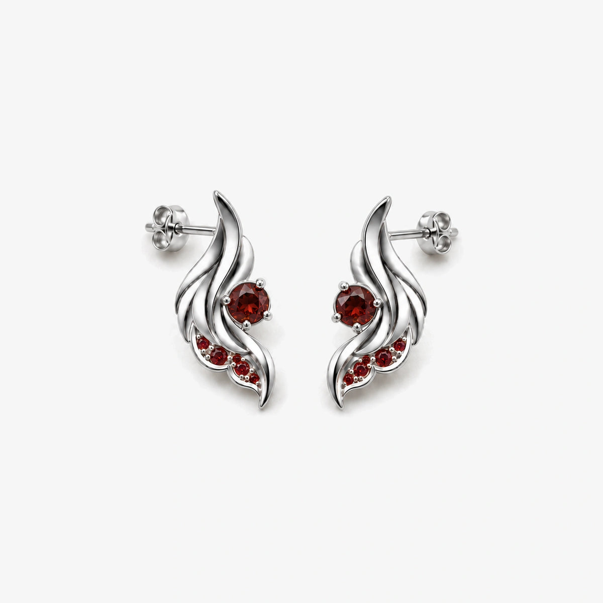 Seraph Wing Earrings in Silver, pair lying flat, front view
