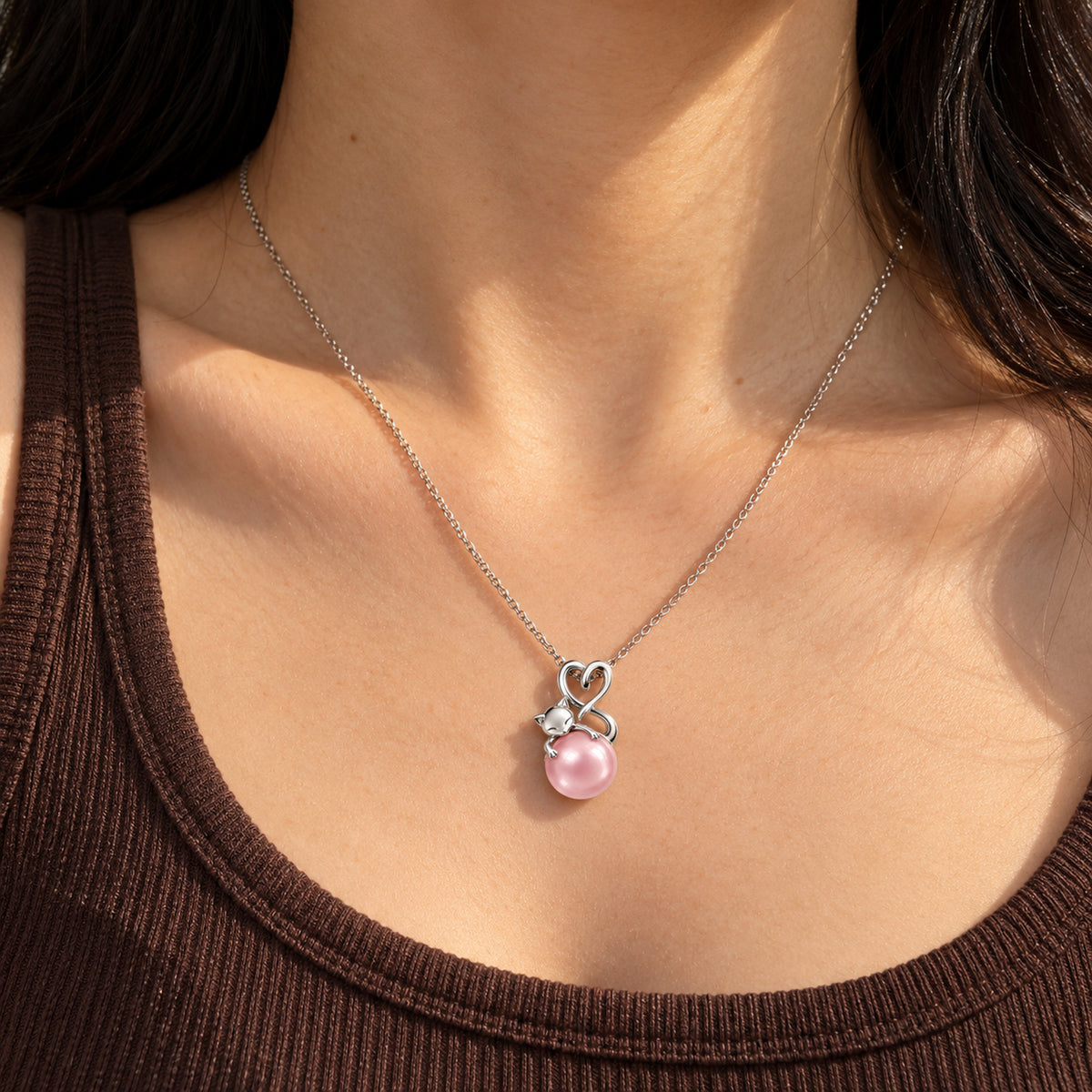 Tail Heart Necklace in silver, worn