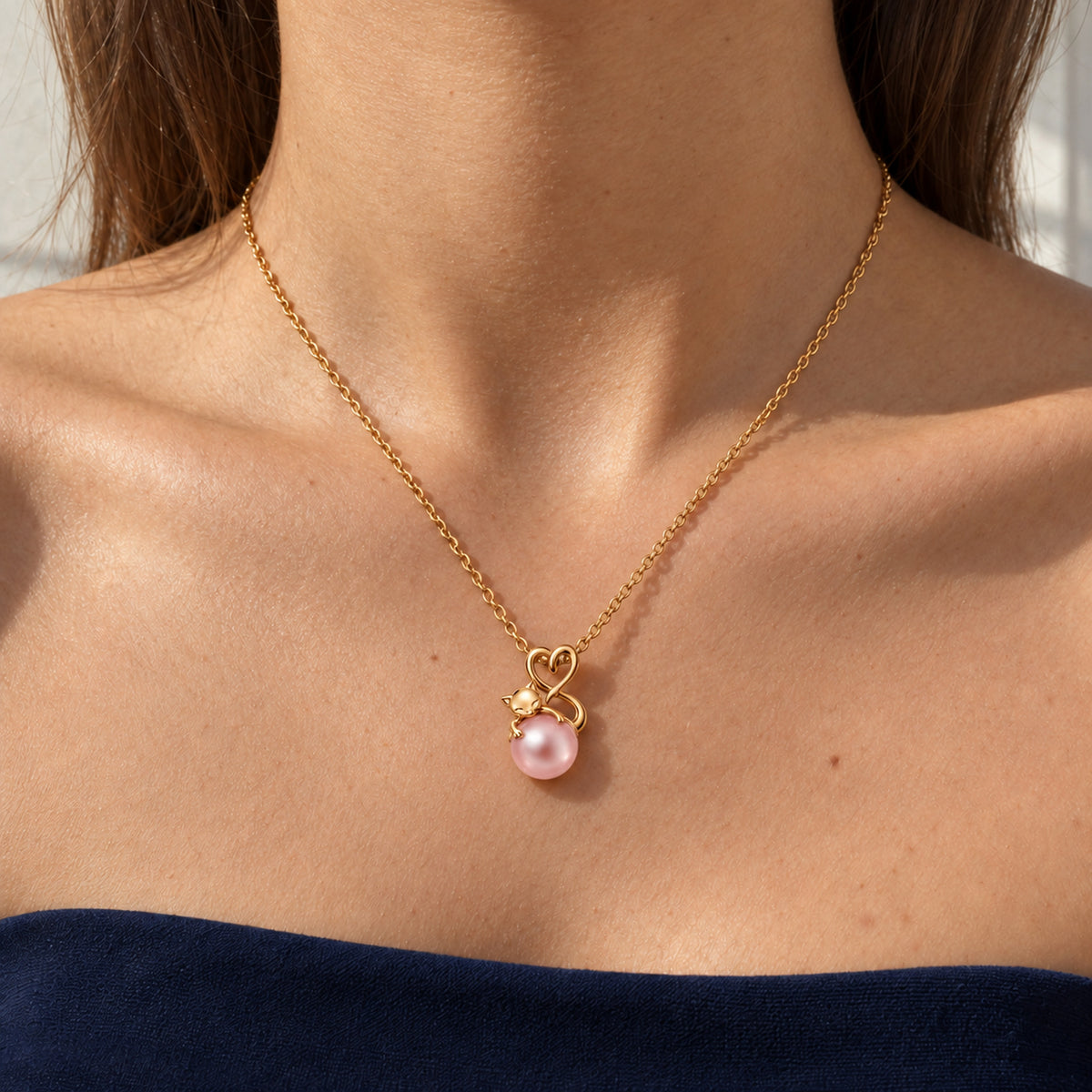 Tail Heart Necklace in gold, worn