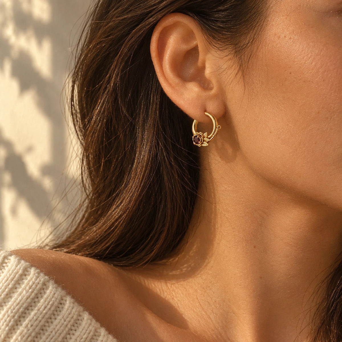 Thorn Princess Earrings in gold, worn