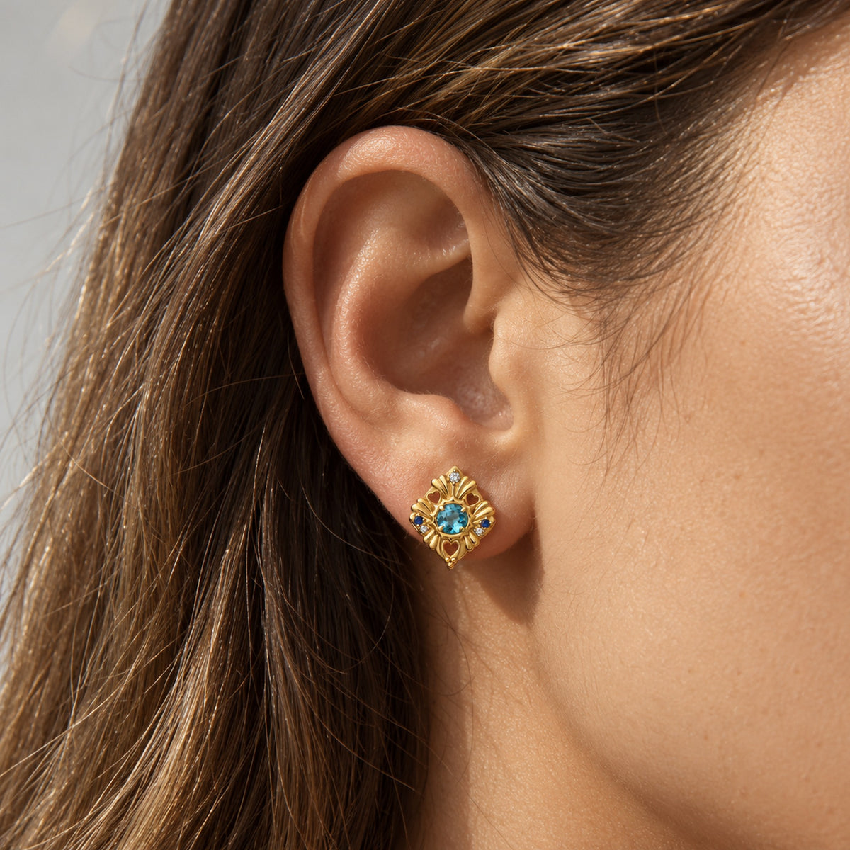 Tide Path Studs in gold, worn