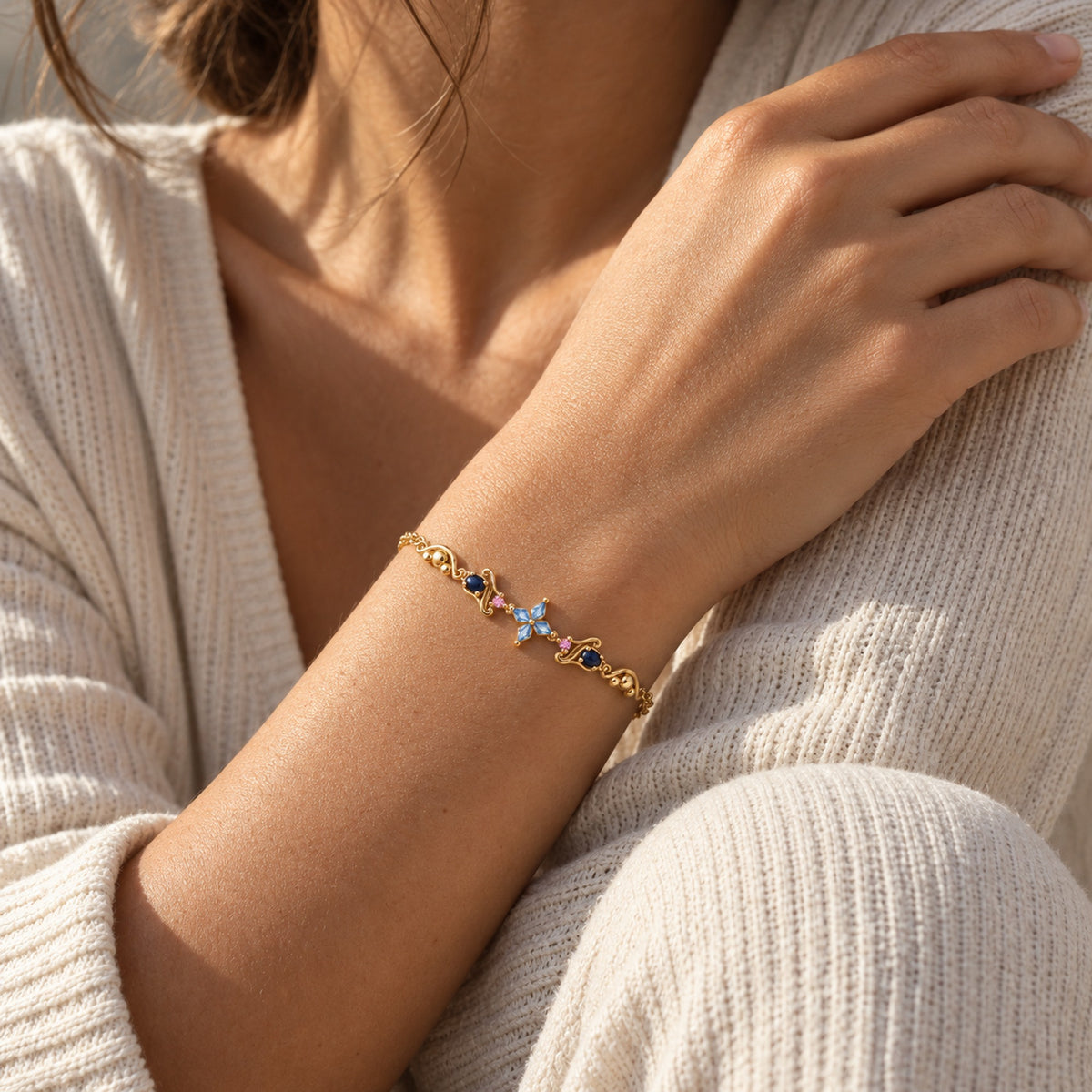 Tongue Scarf Bracelet in gold, worn