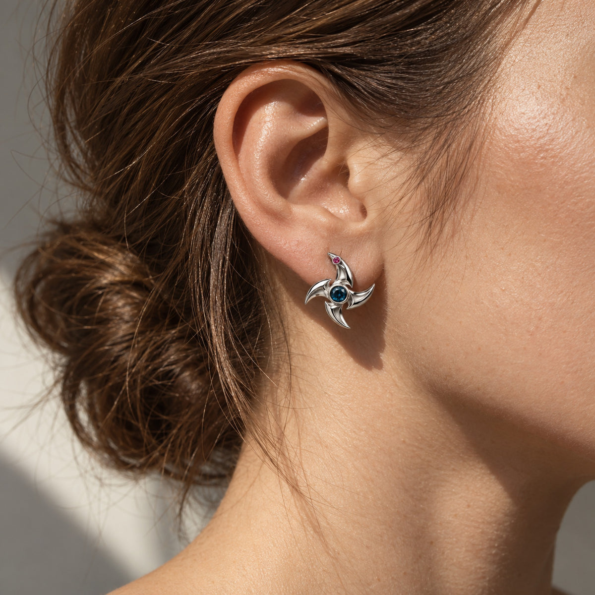 Tongue Scarf Studs in silver, worn