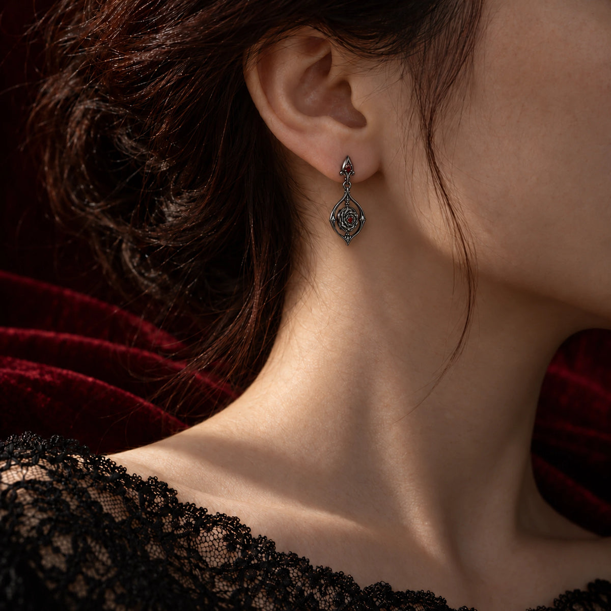 Vanitas Spinner Drop Earrings in Royal Black, worn