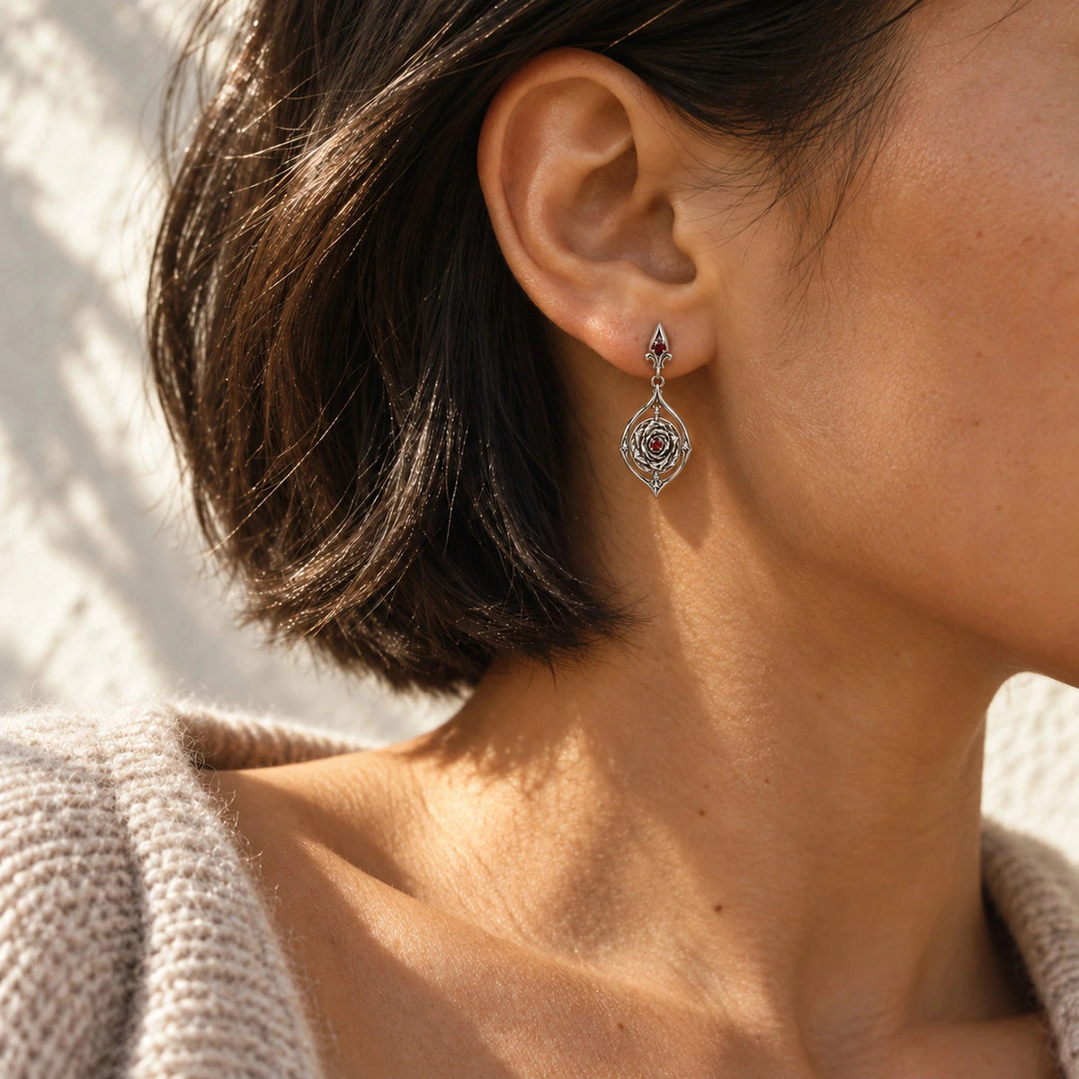 Vanitas Spinner Drop Earrings in Silver, worn
