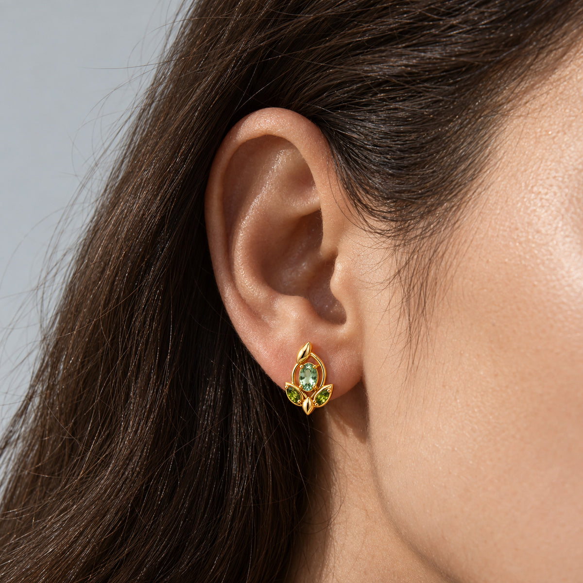 Verdant Path Studs in gold, worn