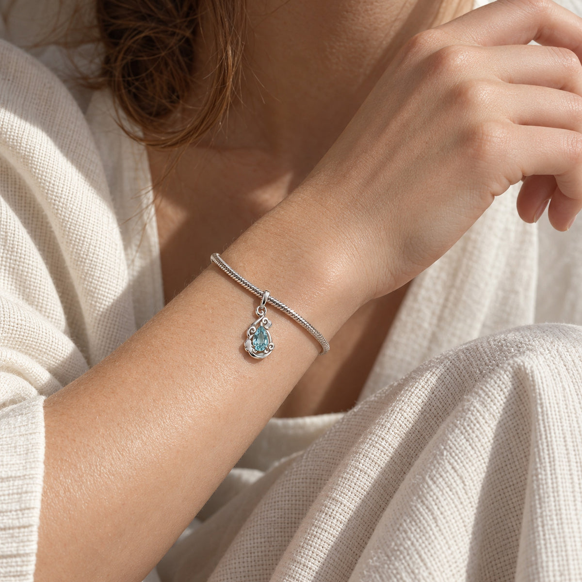Air Nation Cloud Charm in silver, worn