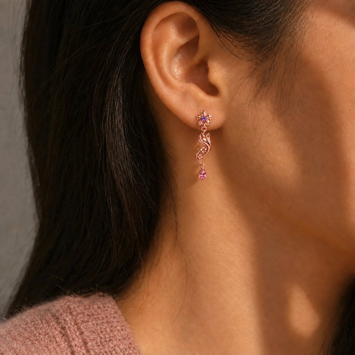 Yae Miko Earrings in rose gold worn